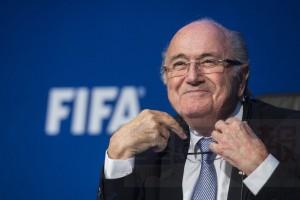 FIFA president Sepp Blatter smiles during a news conference at the FIFA headquarters in Zurich, Switzerland, Monday, July 20, 2015. During an extraordinary FIFA Executive Committee meeting the agenda for the elective Congress for the FIFA presidency was finalized and approved: The congress will take place on Feb. 26, 2016. (Ennio Leanza/Keystone via AP)