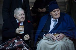 Second World War veterans Patrick Drake, left, 92, and George Pattinson, 94 attend a Remembrance Day ceremony in Vancouver, B.C., on Wednesday November 11, 2015. THE CANADIAN PRESS/Darryl Dyck