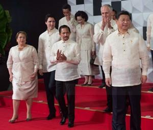 Prime Minister Justin Trudeau, second from left, takes part in the family photo prior to the welcome reception at the APEC Summit in Manila, Philippines on Wednesday, November 18, 2015. THE CANADIAN PRESS/Sean Kilpatrick