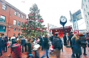 TORONTO, ON- DECEMBER 14     December 14, 2014. People walking by the christmas tree and stage area at  the Toronto Christmas Market in The Distillery District. Vince Talotta/Toronto Star