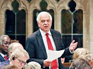 Liberal MP John McCallum stands in the House of Commons during question period on Parliament Hill in Ottawa on Thursday, June 11, 2015. THE CANADIAN PRESS/Fred Chartrand