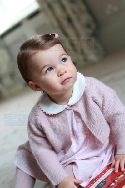 Britain's Princess Charlotte, daughter of the Duke and Duchess of Cambridge, Prince William and his wife Catherine, poses for a photograph in this undated photograph taken by her mother, at Anmer Hall in Norfolk, Britain and released on May 1, 2016.  HRH The Duchess of Cambridge 2016/Courtesy of Kensington Palace/Handout via REUTERS.  ATTENTION EDITORS - THIS IMAGE HAS BEEN PROVIDED BY A THIRD PARTY. NO COMMERCIAL OR BOOK SALES. FOR EDITORIAL USE ONLY. NO RESALES. NO ARCHIVE. ONE TIME USE ONLY.      TPX IMAGES OF THE DAY