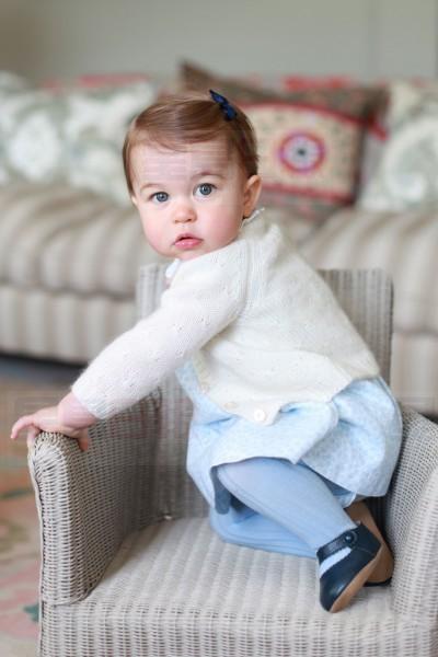 Britain's Princess Charlotte, daughter of the Duke and Duchess of Cambridge, Prince William and his wife Catherine, poses for a photograph in this undated photograph taken by her mother, at Anmer Hall in Norfolk, Britain and released on May 1, 2016.  HRH The Duchess of Cambridge 2016/Courtesy of Kensington Palace/Handout via REUTERS.  ATTENTION EDITORS - THIS IMAGE HAS BEEN PROVIDED BY A THIRD PARTY. NO COMMERCIAL OR BOOK SALES. FOR EDITORIAL USE ONLY. NO RESALES. NO ARCHIVE. ONE TIME USE ONLY.