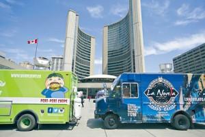 TORONTO, ON - MAY 11, 2016 Food catering trucks line up at Nathan Phillips Square before the start of the lunch hour rush. The City of Toronto has loosened food truck licensing rules to strike a balance and foster creativity according to Mayor John Tory. MAY 11, 2016  Chris So/Toronto Star