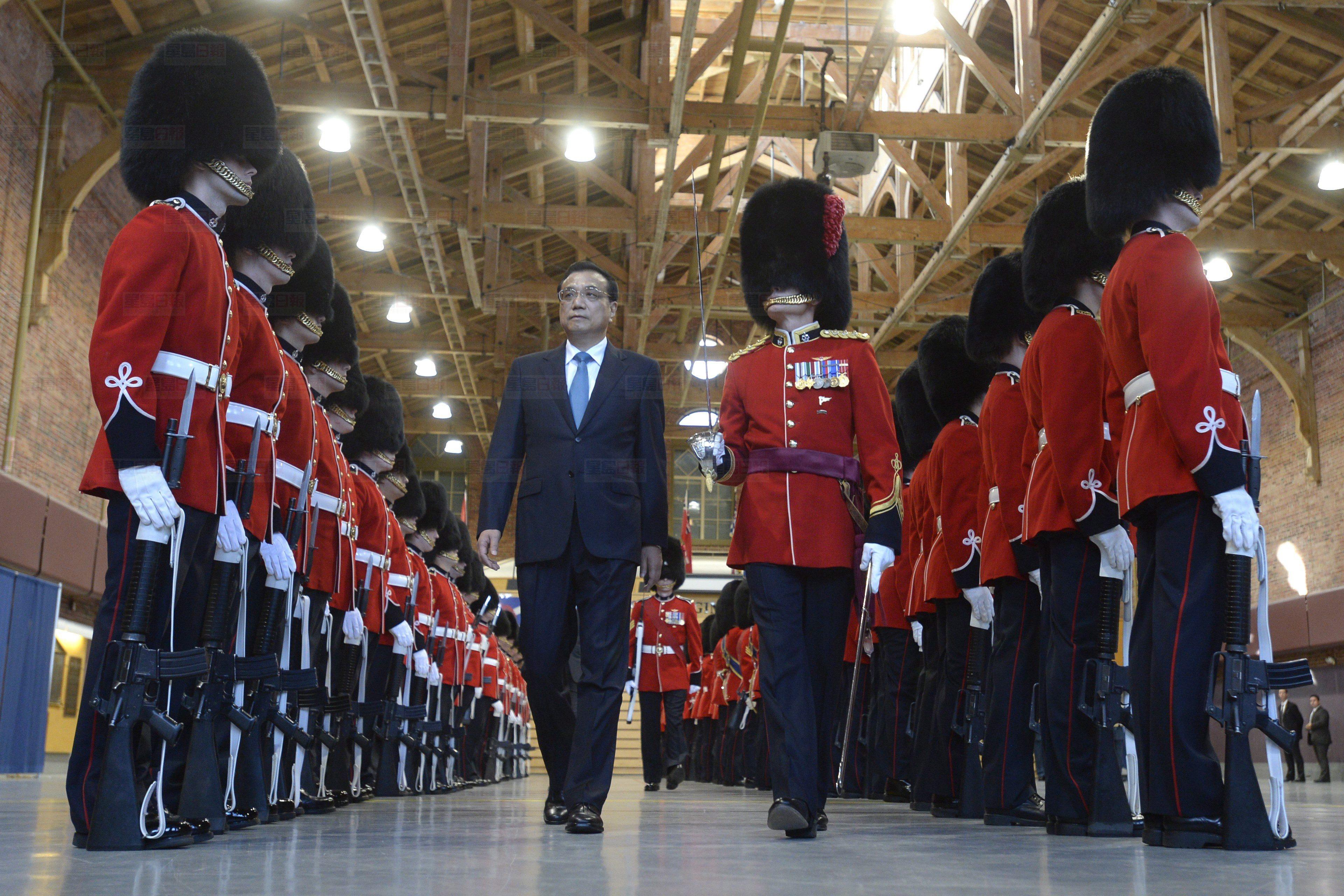 Premier of the State Council of the People’s Republic of China, Li Keqiang attends a welcoming ceremony with military honours in Ottawa on Thursday, September 22, 2016. THE CANADIAN PRESS/Adrian Wyld