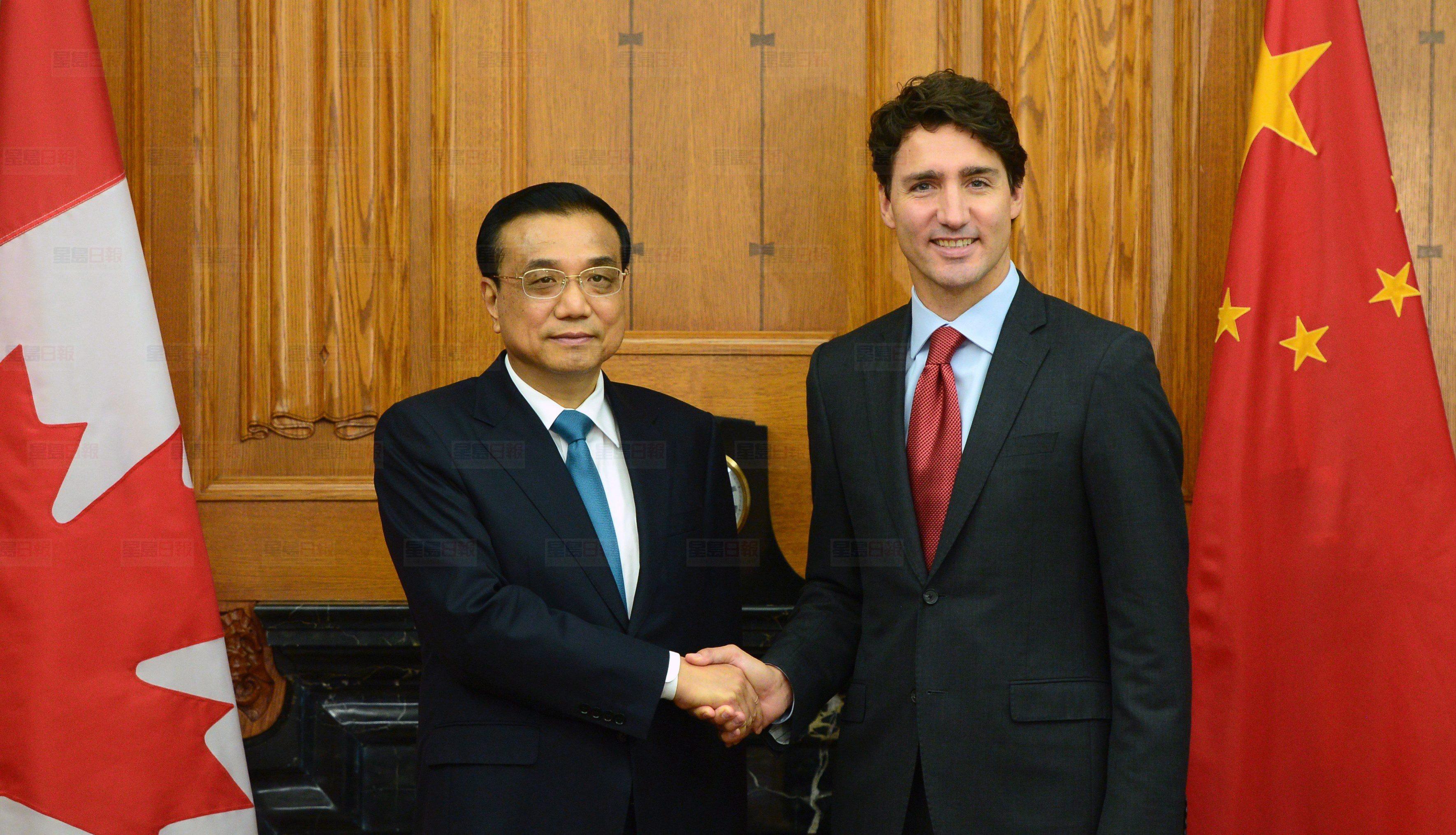 Canadian Prime Minister Justin Trudeau holds expanded meeting with Chinese Premier Li Keqiang in the Cabinet room on Parliament Hill in Ottawa on Thursday, Sept. 22, 2016. THE CANADIAN PRESS/Sean Kilpatrick