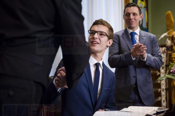 Nineteen-year-old Sam Oosterhoff, centre, is sworn in as the youngest-ever member of the Ontario legislature as Ontario PC Leader Patrick Brown, right, looks on in Toronto Wednesday, November 30, 2016. The Progressive Conservative was elected Nov. 17 in a byelection in Niagara West-Glanbrook, previously held by former party leader Tim Hudak. THE CANADIAN PRESS/Christopher Katsarov