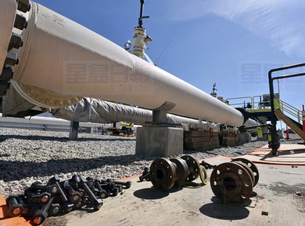 FILE - In this June 8, 2017, file photo, fresh nuts, bolts and fittings are ready to be added to the east leg of the pipeline near St. Ignace, Mich., as Enbridge Inc., prepares to test the east and west sides of the Line 5 pipeline under the Straits of Mackinac in Mackinaw City, Mich. Michigan Gov. Gretchen Whitmer says she’s open to allowing construction of an oil pipeline tunnel beneath the channel where Lakes Huron and Michigan meet. Whitmer told reporters Wednesday, APRIL 17, 2019, in Lansing, her goal remains getting Enbridge’s Line 5 out of the Straits of Mackinac as quickly as possible. (Dale G Young/Detroit News via AP, File)
