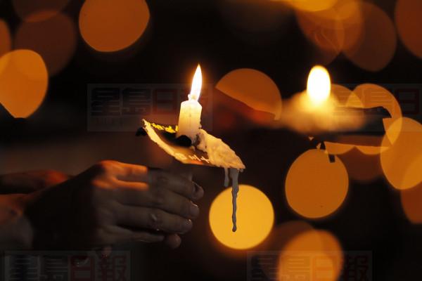Thousands of people attend a candlelight vigil for victims of the Chinese government's brutal military crackdown three decades ago on protesters in Beijing's Tiananmen Square at Victoria Park in Hong Kong, Tuesday, June 4, 2019. Hong Kong is the only region under Beijing's jurisdiction that holds significant public commemorations of the 1989 crackdown and memorials for its victims. Hong Kong has a degree of freedom not seen on the mainland as a legacy of British rule that ended in 1997. (AP Photo/Kin Cheung)