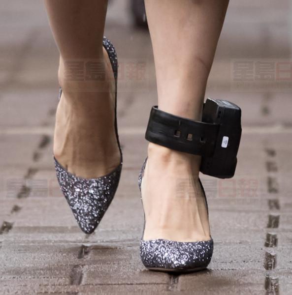 Huawei chief financial officer Meng Wanzhou, who is out on bail and remains under partial house arrest after she was detained last year at the behest of American authorities, wears an electronic monitoring bracelet on her ankle as she leaves her home to attend a court hearing in Vancouver, on Monday September 23, 2019. THE CANADIAN PRESS/Darryl Dyck