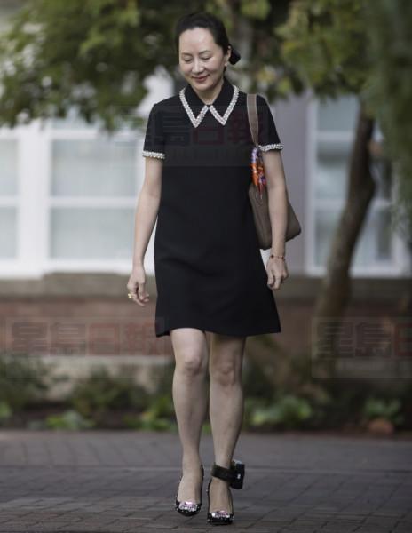 Huawei chief financial officer Meng Wanzhou, who is out on bail and remains under partial house arrest after she was detained last year at the behest of American authorities, leaves her home to attend a court hearing in Vancouver, on Tuesday, Sept. 24, 2019. (Darryl Dyck/The Canadian Press via AP)