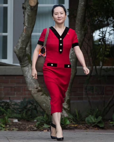 Huawei chief financial officer Meng Wanzhou, who is out on bail and remains under partial house arrest after she was detained last year at the behest of American authorities, leaves her home to attend a court hearing, in Vancouver, on Tuesday October 1, 2019. THE CANADIAN PRESS/Darryl Dyck