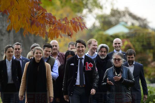 Liberal leader Justin Trudeau walks with Liberal candidates during a campaign stop at the Botanical Garden in Montreal on Wednesday Oct. 16, 2019. THE CANADIAN PRESS/Sean Kilpatrick