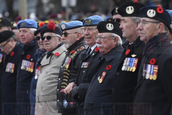 Veterans participate in the National Remembrance Day Ceremony at the National War Memorial in Ottawa, Monday, November 11, 2019. THE CANADIAN PRESS/Adrian Wyld