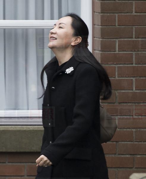 Meng Wanzhou, chief financial officer of Huawei leaves her home in Vancouver, Monday, January, 20, 2020. A court hearing begins today in Vancouver over the American request to extradite an executive of the Chinese telecom giant Huawei on fraud charges. THE CANADIAN PRESS/Jonathan Hayward