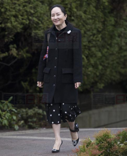 Meng Wanzhou, chief financial officer of Huawei leaves her home in Vancouver, Monday, January, 20, 2020. A court hearing begins today in Vancouver over the American request to extradite an executive of the Chinese telecom giant Huawei on fraud charges. THE CANADIAN PRESS/Jonathan Hayward