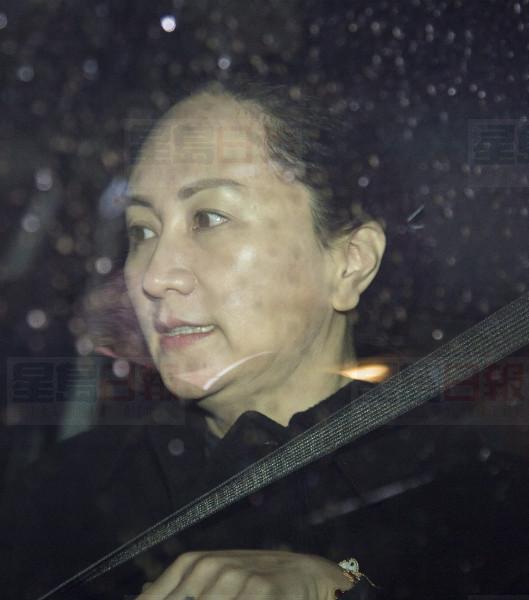 Meng Wanzhou chief financial officer of Huawei is pictured in her SUV as she leaves B.C. Supreme Court in Vancouver, Wednesday, January 22, 2020. Wanzhou is in court for hearings over an American request to extradite the executive of the Chinese telecom giant Huawei on fraud charges. THE CANADIAN PRESS/Jonathan Hayward