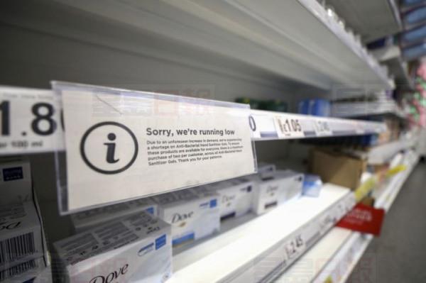 An advisory informs customers they are limited to purchase only two anti-bacterial hand santizier gels each on an empty shelf edge in the soap aisle at an Asda supermarket, operated by Walmart Inc., in Wheatley, U.K., on Friday, March 6, 2020. The stockpiling crisis that has hit supermarkets across Asia has spread to Europe as consumers start hoarding groceries and hygiene products amid fears of a coronavirus pandemic. Photographer: Chris Ratcliffe/Bloomberg via Getty Images