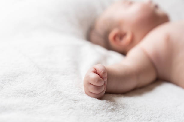 portrait of asian cute baby, hand