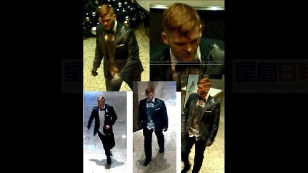 衣冠楚楚男子闖入辦公室潑漆 被監控捕捉到