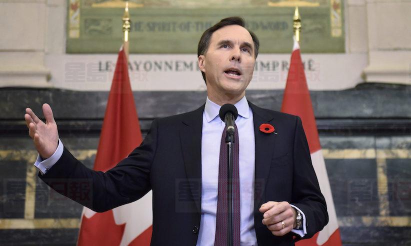 回应保守党批评 联邦财长捐献股票盈利做慈善