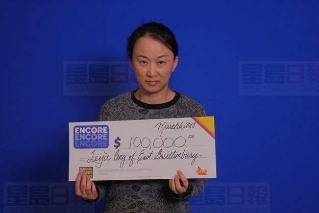 華人女子贏得10萬元649彩票獎金！彩票在大統華購得