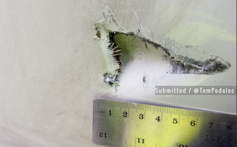 強風捲起箱子 東航多倫多至上海飛機被砸大洞！