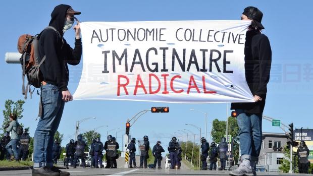 魁省今早有反G7峰會 警方將示威者和平清場