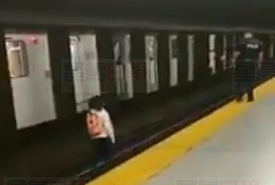 【有片】粉紅背囊男跳地鐵路軌 涉搶劫案與警追逐