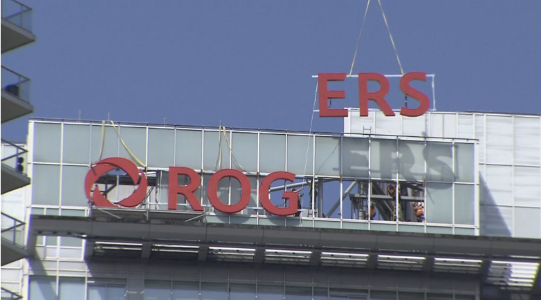 直升機搬運新標誌 溫哥華蕭氏大廈更名為羅渣士大廈