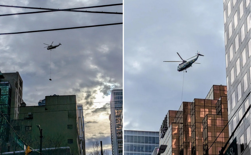 龐然大物呼嘯高廈上空 市中心實施封路原來為了裝空調